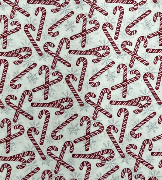 Red Tossed CandyCane Studio E Fabric 112cm Wide